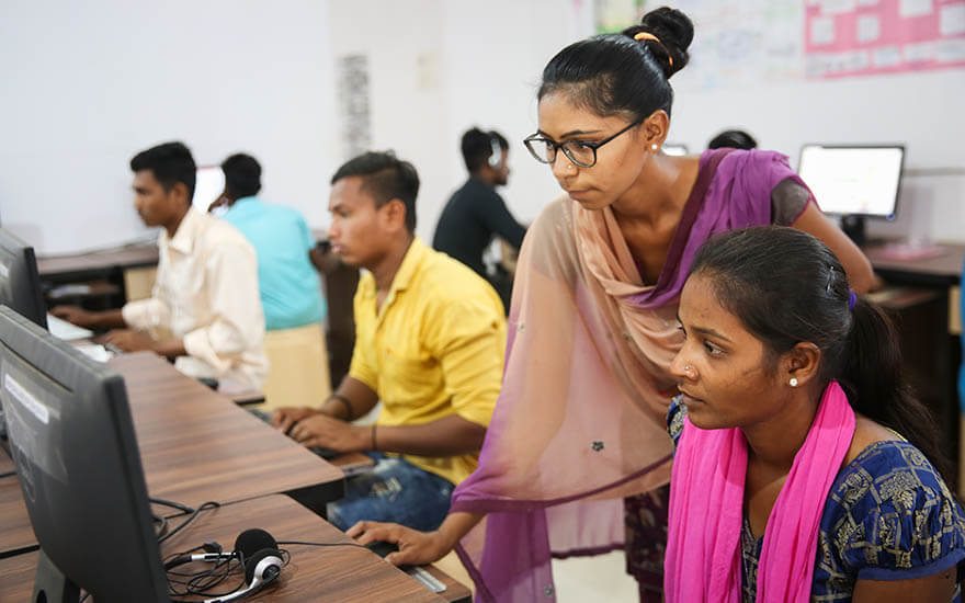Indian youth at computers
