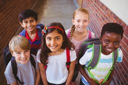 A group of smiling school children