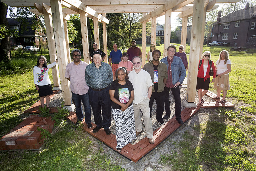 Members of the Feedom Freedom program in front of a pavilion